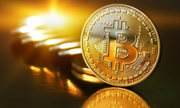 Tiền ảo Bitcoin lập đỉnh 5.800USD/coin