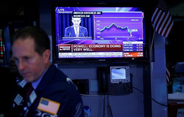 Dow Jones lùi bước sau quyết định nâng lãi suất của FED