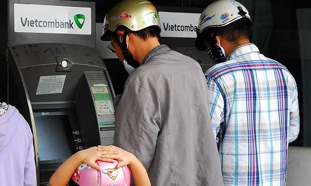 Thanh toán dịch vụ công qua ngân hàng còn thấp