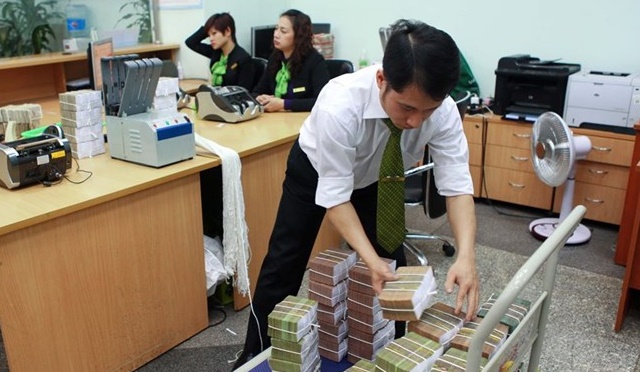 Cơ cấu lại hệ thống các tổ chức tín dụng gắn với xử lý nợ xấu