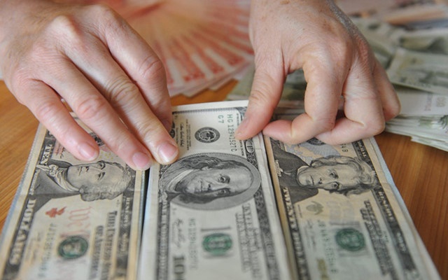 Tỷ giá trung tâm tăng theo USD Index
