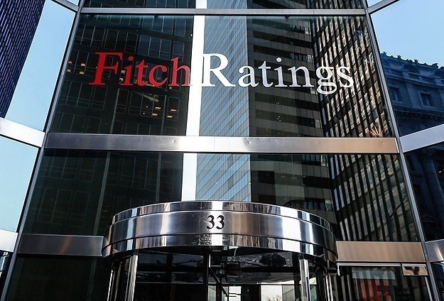 Fitch hạ mạnh dự báo tăng trưởng GDP Trung Quốc và khu vực đồng tiền chung châu Âu