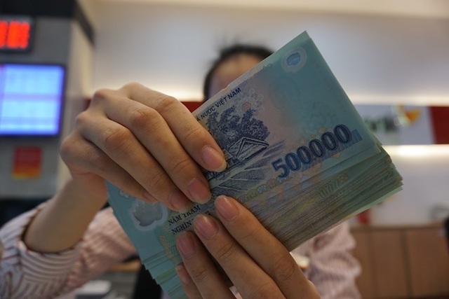 Doanh nghiệp rút mạnh tiền gửi tại ngân hàng