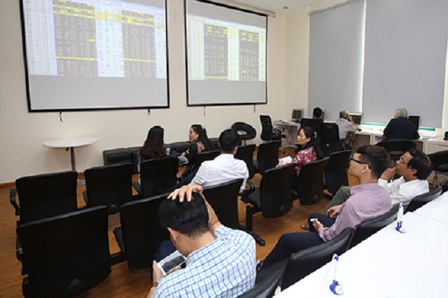 Lợi nhuận ròng các doanh nghiệp niêm yết giảm 14,4% trong quý II