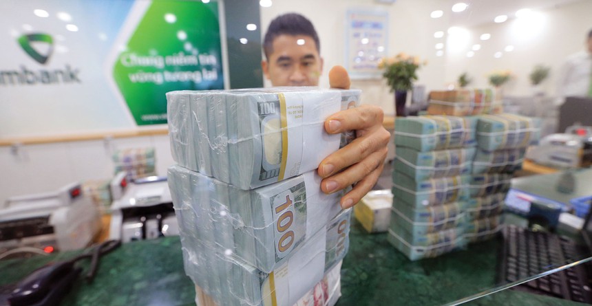 Áp lực từ thị trường quốc tế khó làm tỷ giá trong nước biến động mạnh