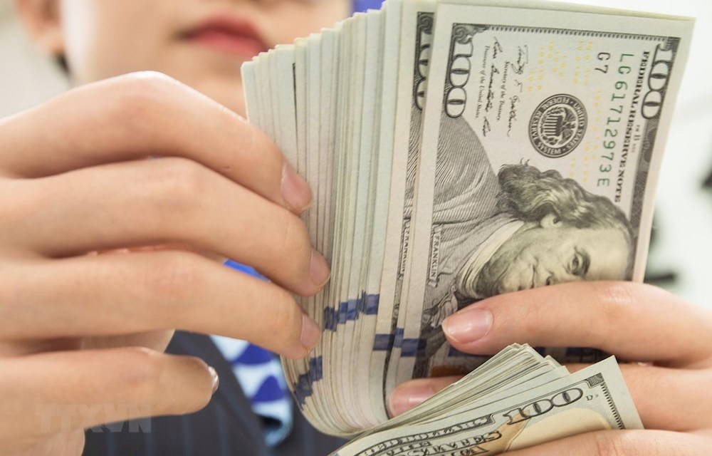Thị trường tiền tệ ngày 1/3: Giá vàng thế giới chịu áp lực từ đồng USD tăng