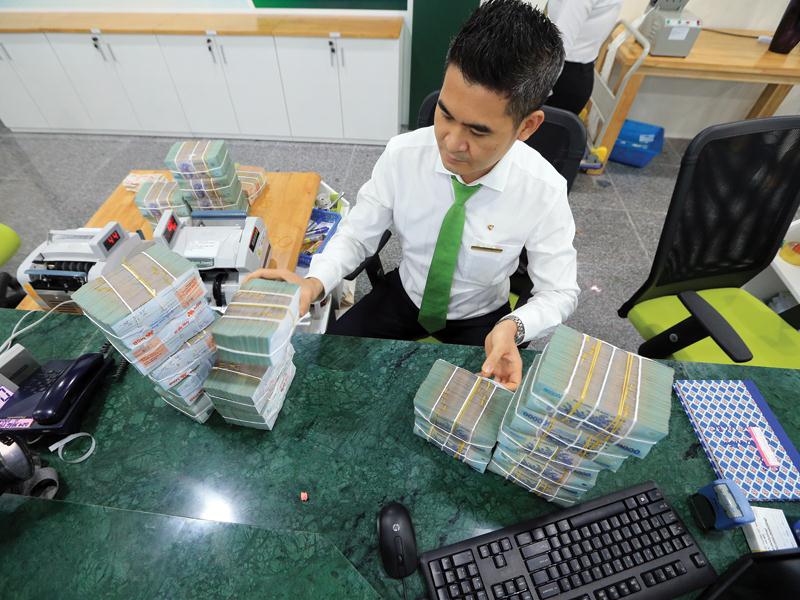 Tăng trưởng huy động vốn không bắt kịp tín dụng