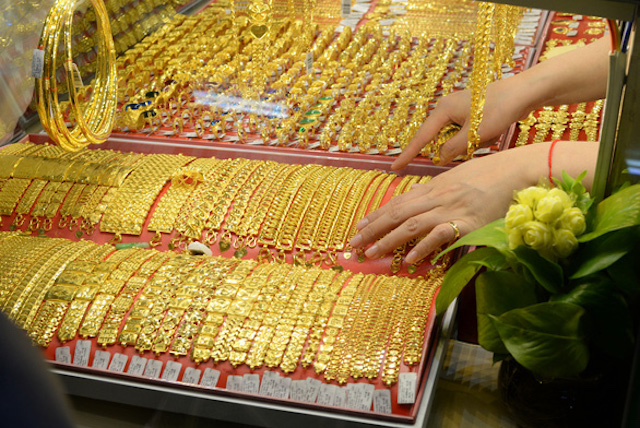 Giá vàng trong nước giảm, đồng USD biến động nhẹ