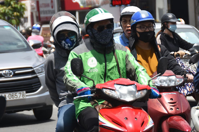Grab thu phụ phí nắng nóng 5.000 đồng/mỗi chuyến, Bộ Công Thương yêu cầu giải trình