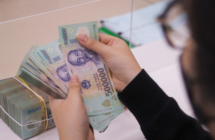 Thiếu vốn kinh doanh, doanh nghiệp 'ngóng' ngân hàng được nới room tín dụng