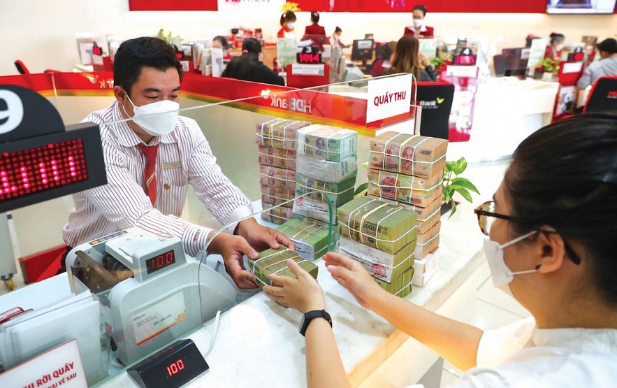 Vì sao lãi suất liên ngân hàng khó hạ nhiệt?