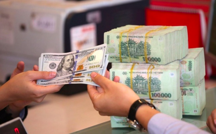 Lý do nào khiến nhu cầu mua USD tăng lên?