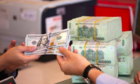 Lý do nào khiến nhu cầu mua USD tăng lên?