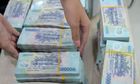 Ngân hàng chi hàng chục nghìn tỷ đồng để &#039;thưởng nóng&#039; cổ đông